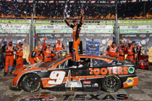 Chase Elliott, driver of the #9 Hooters Chevrolet, celebrates in victory lane after winning the NASCAR Cup Series AutoTrader EchoPark Automotive 400 at Texas Motor Speedway on April 14, 2024 in Fort Worth, Texas. (Photo by Chris Graythen/Getty Images)