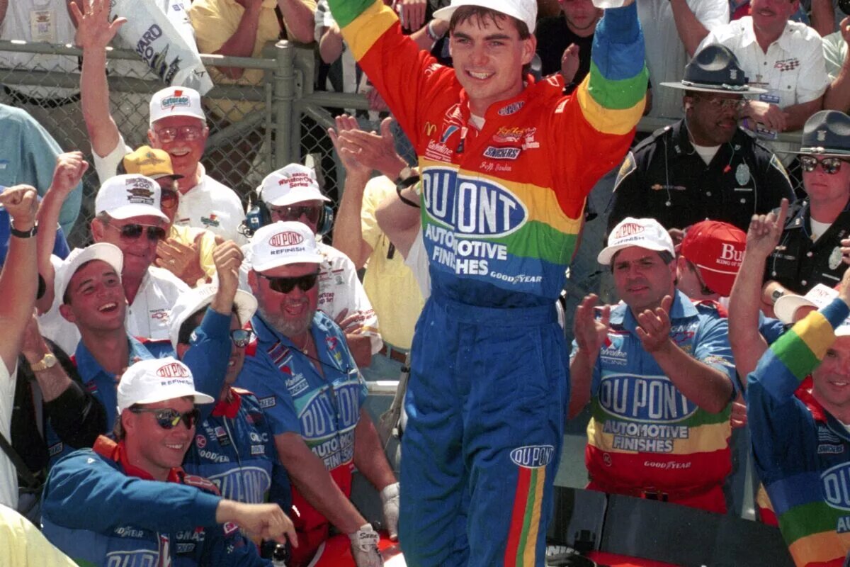 SPEEDWAY, IN - AUGUST 6: Driver Jeff Gordon celebrates in Victory Lane after winning the Brickyard 400 race on August 6, 1994 at the Indianapolis Motor Speedway in Speedway, Indiana. (Photo by Dozier Mobley/Getty Images)