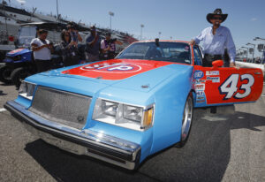 MADISON, ILLINOIS - JUNE 03: NASCAR Hall of Famer Richard Petty prepares to drive a replica of his #43 STP Pontiac during practice for the NASCAR Cup Series Enjoy Illinois 300 at WWT Raceway on June 03, 2022 in Madison, Illinois. (Photo by Sean Gardner/Getty Images)