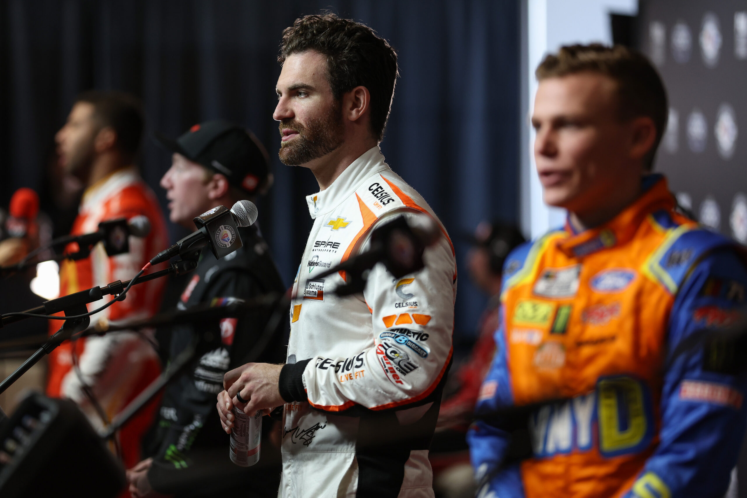DAYTONA BEACH, FLORIDA - FEBRUARY 15: Corey LaJoie, driver of the #7 Celsius Chevrolet, speaks to the media during the NASCAR Cup Series 65th Annual Daytona 500 Media Day at Daytona International Speedway on February 15, 2023 in Daytona Beach, Florida. (Photo by James Gilbert/Getty Images)
