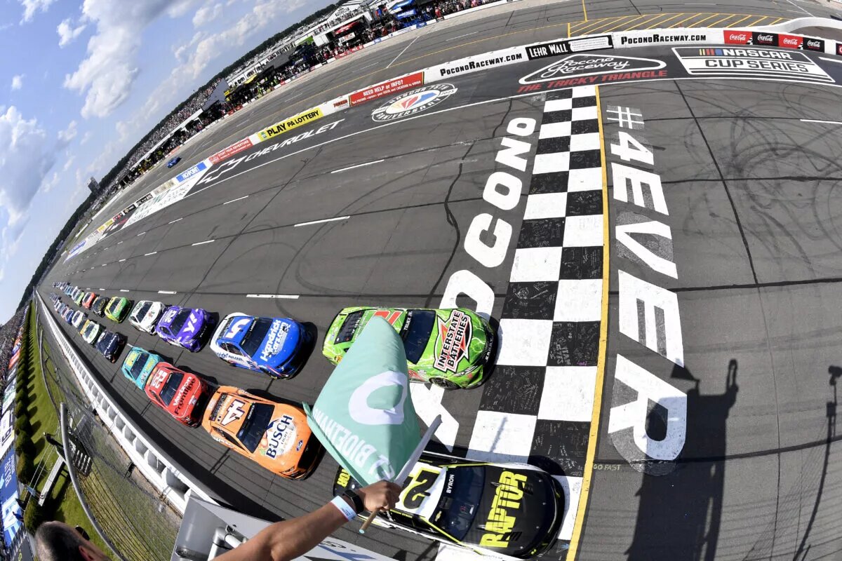 LONG POND, PENNSYLVANIA - JULY 23: William Byron, driver of the #24 RaptorTough.com Chevrolet, leads the field to the green flag to start the NASCAR Cup Series HighPoint.com 400 at Pocono Raceway on July 23, 2023 in Long Pond, Pennsylvania. (Photo by Logan Riely/Getty Images) Pocono Raceway.