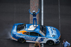 INDIANAPOLIS, INDIANA - JULY 21: Kyle Larson, driver of the #5 HendrickCars.com Chevrolet, celebrates after winning the NASCAR Cup Series Brickyard 400 at Indianapolis Motor Speedway on July 21, 2024 in Indianapolis, Indiana. (Photo by James Gilbert/Getty Images)