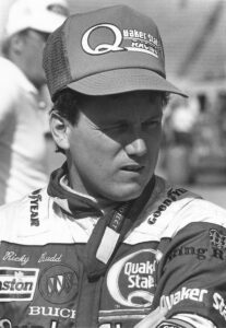 1989: Baby-faced Ricky Rudd shows his true nature behind the wheel as he bumps and blocks Rusty Wallace to win the inaugural NASCAR event at Sears Point International Raceway, later renamed Infineon Raceway. Wallace complained about Rudd's tactics, but to no avail. Rudd?s fancy heel & toe brake and clutch action brought the TV ?foot cam? into his car. (Photo by RacingOne/Getty Images)