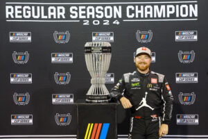 DARLINGTON, SOUTH CAROLINA - SEPTEMBER 01: 2024 Regular Season Champion, Tyler Reddick, driver of the #45 Upper Deck Toyota, poses with the trophy after the NASCAR Cup Series Cook Out Southern 500 at Darlington Raceway on September 01, 2024 in Darlington, South Carolina. (Photo by Meg Oliphant/Getty Images)