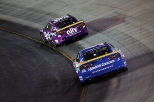 BRISTOL, TENNESSEE - SEPTEMBER 21: Alex Bowman, driver of the #48 Ally Chevrolet, and Kyle Larson, driver of the #5 HendrickCars.com Chevrolet, race during the NASCAR Cup Series Bass Pro Shops Night Race at Bristol Motor Speedway on September 21, 2024 in Bristol, Tennessee. (Photo by Jonathan Bachman/Getty Images)