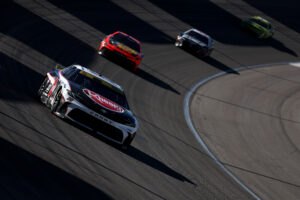 LAS VEGAS, NEVADA - OCTOBER 20: Christopher Bell, driver of the #20 Rheem Toyota, drives during the NASCAR Cup Series South Point 400 at Las Vegas Motor Speedway on October 20, 2024 in Las Vegas, Nevada. (Photo by Meg Oliphant/Getty Images)