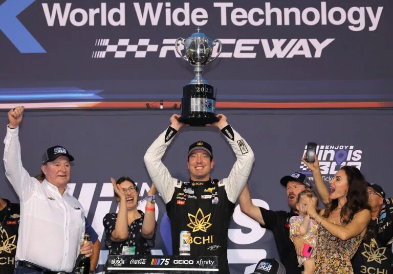 MADISON, ILLINOIS - JUNE 04: Kyle Busch, driver of the #8 3CHI Chevrolet, celebrates with RCR team owner and NASCAR Hall of Famer, Richard Childress and wife, Samantha Busch in victory lane after winning the NASCAR Cup Series Enjoy Illinois 300 at WWT Raceway on June 04, 2023 in Madison, Illinois. (Photo by Jonathan Bachman/Getty Images)