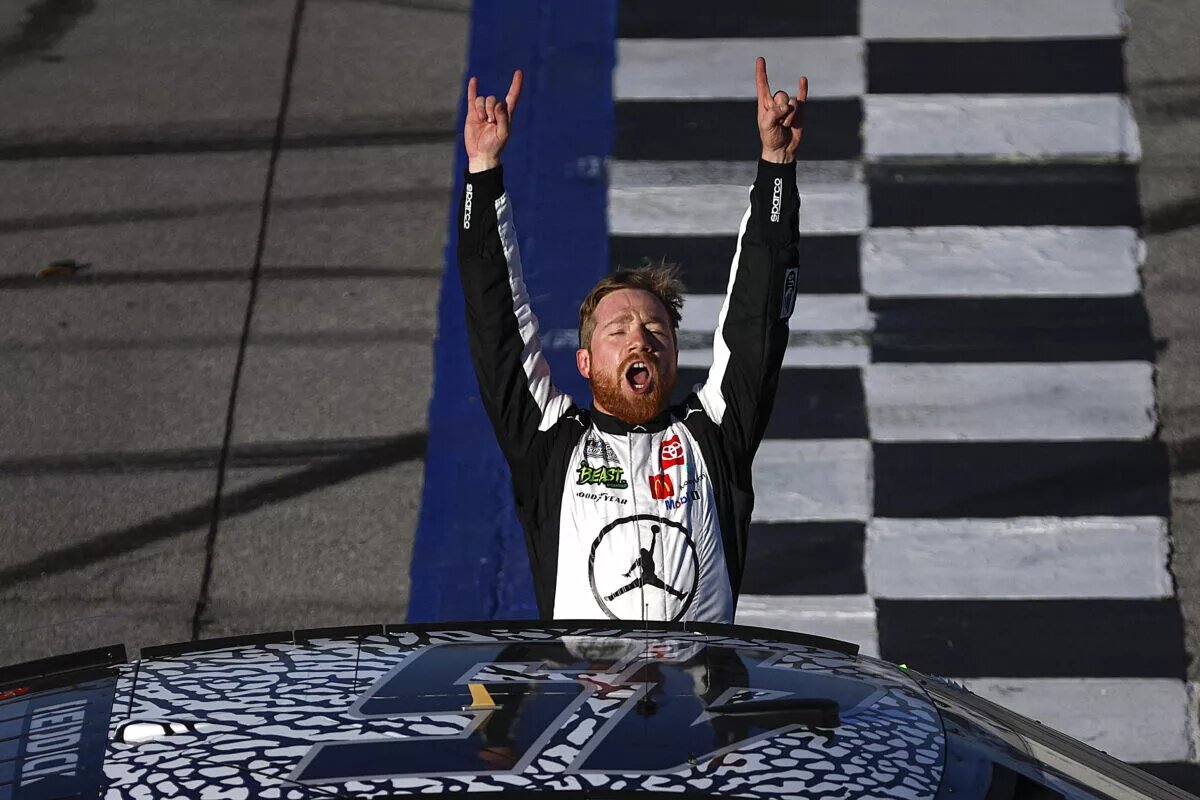 TALLADEGA, ALABAMA - APRIL 21: Tyler Reddick, driver of the #45 Jordan Brand Toyota, celebrates after winning the NASCAR Cup Series GEICO 500 at Talladega Superspeedway on April 21, 2024 in Talladega, Alabama. (Photo by Sean Gardner/Getty Images)