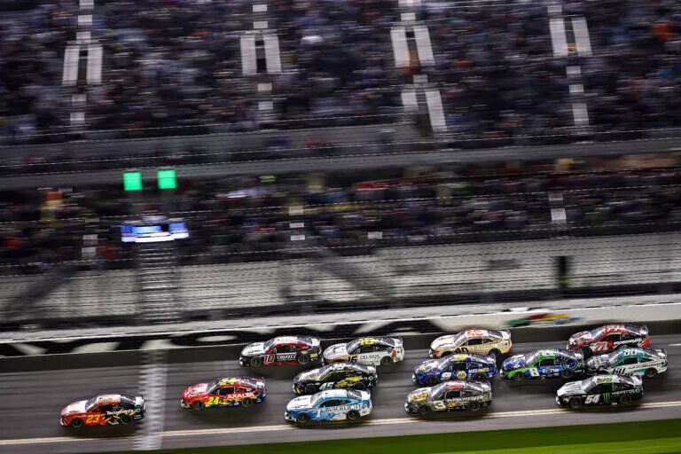 DAYTONA BEACH, FLORIDA - FEBRUARY 13: Bubba Wallace, driver of the #23 McDonald's Toyota crosses the finish line to win the NASCAR Cup Series Duel 1at Daytona International Speedway on February 13, 2025 in Daytona Beach, Florida. (Photo by Jared C. Tilton/Getty Images)