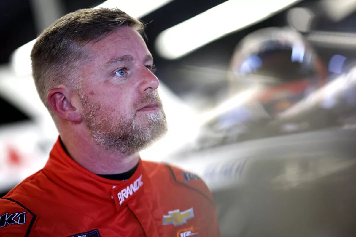 DAYTONA BEACH, FLORIDA - FEBRUARY 14: Justin Allgaier, driver of the #7 BRANDT Chevrolet looks on in the garage area during practice for the NASCAR Xfinity Series United Rentals 300 at Daytona International Speedway on February 14, 2025 in Daytona Beach, Florida. (Photo by Sean Gardner/Getty Images)