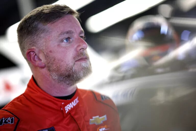 DAYTONA BEACH, FLORIDA - FEBRUARY 14: Justin Allgaier, driver of the #7 BRANDT Chevrolet looks on in the garage area during practice for the NASCAR Xfinity Series United Rentals 300 at Daytona International Speedway on February 14, 2025 in Daytona Beach, Florida. (Photo by Sean Gardner/Getty Images)