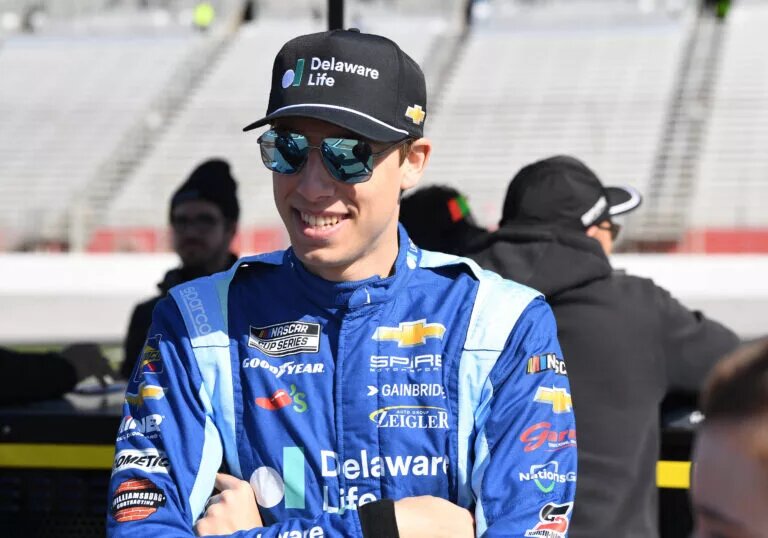 ATLANTA, GA - FEBRUARY 22: Carson Hocevar ( 77 Spire Motorsports Delaware Life Chevrolet) looks on during qualifying for the running of the NASCAR, Motorsport, USA Cup Series Ambetter Health 400 on February 22, 2025, at Atlanta Motor Speedway in Hampton, GA. (Photo by Jeffrey Vest Icon Sportswire)