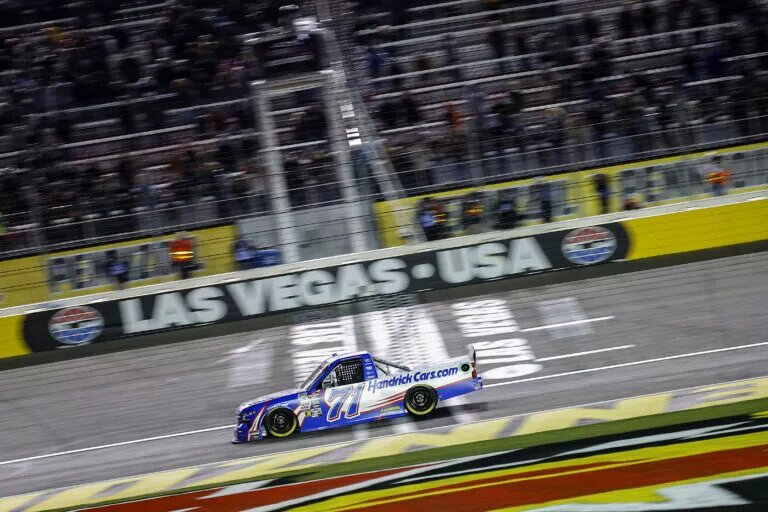 LAS VEGAS, NEVADA - MARCH 01: Rajah Caruth, driver of the #71 HendrickCars.com Chevrolet, crosses the finish line to win the NASCAR Craftsman Truck Series Victoria's Voice Foundation 200 at Las Vegas Motor Speedway on March 01, 2024 in Las Vegas, Nevada. (Photo by Chris Graythen/Getty Images)
