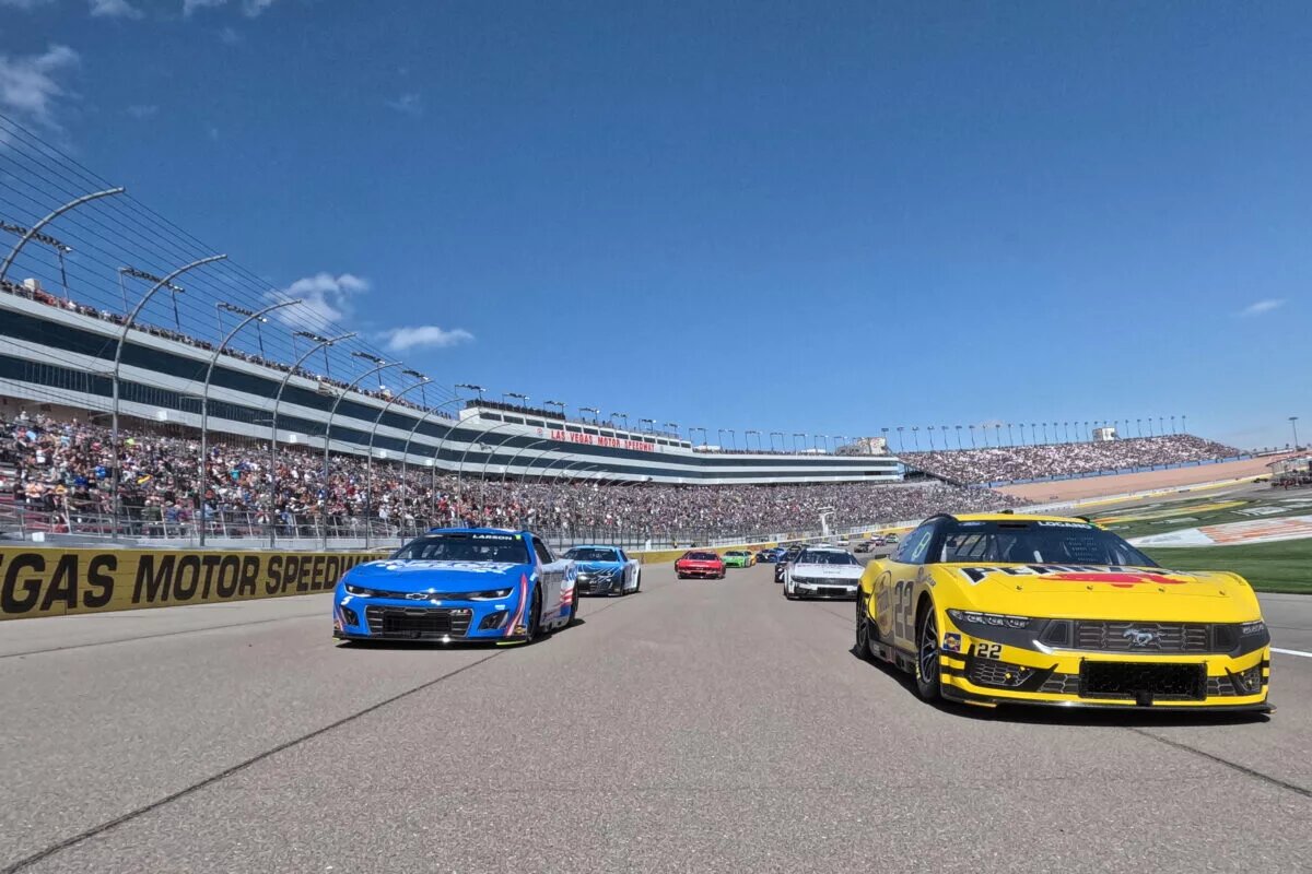LAS VEGAS, NEVADA - MARCH 03: Joey Logano, driver of the #22 Pennzoil Ford, and Kyle Larson, driver of the #5 HendrickCars.com Chevrolet, lead the field on a pace lap prior to the NASCAR Cup Series Pennzoil 400 at Las Vegas Motor Speedway on March 03, 2024 in Las Vegas, Nevada. (Photo by Chris Graythen/Getty Images)
