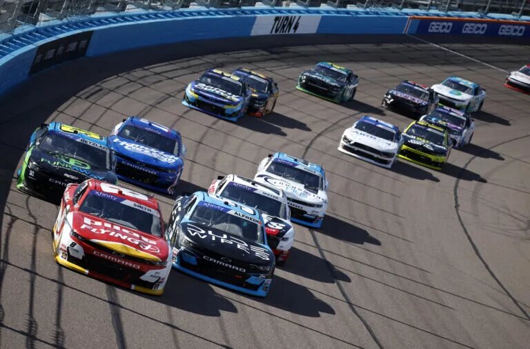AVONDALE, ARIZONA - MARCH 09: Brandon Jones, driver of the #9 Menards/Little Giant Chevrolet, Garrett Smithley, driver of the #6 TeamJDMotorsports.com Chevrolet, Sam Mayer, driver of the #1 Tire Pros Chevrolet, and Parker Retzlaff, driver of the #31 FunkAway Chevrolet, race during the NASCAR Xfinity Series Call 811.com Every Dig. Every Time. 200 at Phoenix Raceway on March 09, 2024 in Avondale, Arizona. (Photo by Chris Graythen/Getty Images)