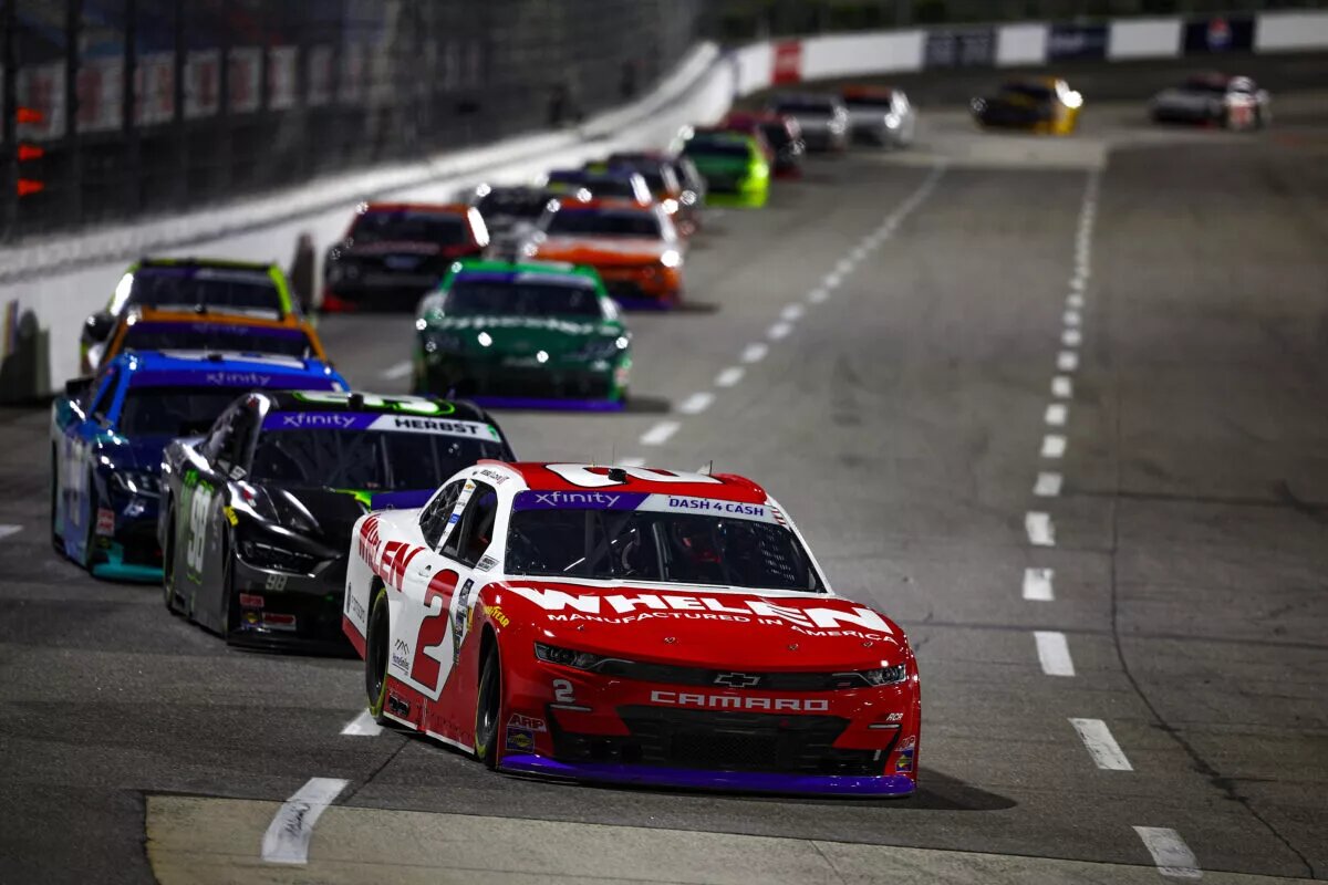 MARTINSVILLE, VIRGINIA - APRIL 06: Jesse Love, driver of the #2 Whelen Chevrolet, Riley Herbst, driver of the #98 Monster Energy Ford, and Taylor Gray, driver of the #19 Place of Hope Toyota, race during the NASCAR Xfinity Series DUDE Wipes 250 at Martinsville Speedway on April 06, 2024 in Martinsville, Virginia. (Photo by Jared C. Tilton/Getty Images)