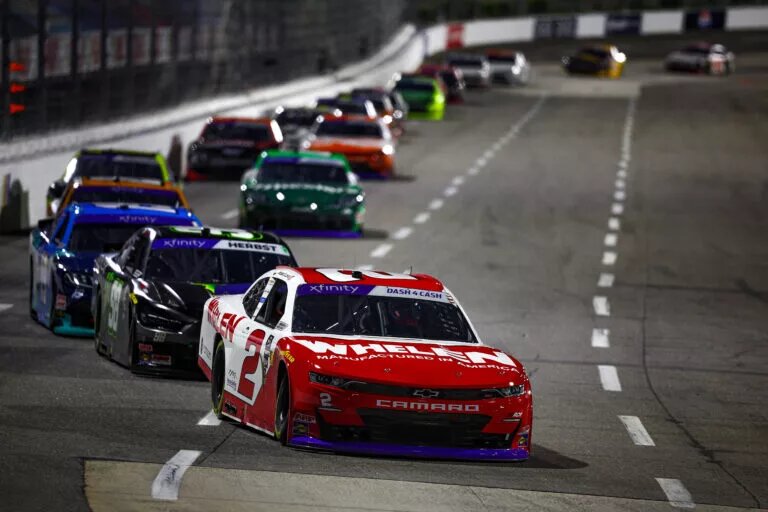 MARTINSVILLE, VIRGINIA - APRIL 06: Jesse Love, driver of the #2 Whelen Chevrolet, Riley Herbst, driver of the #98 Monster Energy Ford, and Taylor Gray, driver of the #19 Place of Hope Toyota, race during the NASCAR Xfinity Series DUDE Wipes 250 at Martinsville Speedway on April 06, 2024 in Martinsville, Virginia. (Photo by Jared C. Tilton/Getty Images)