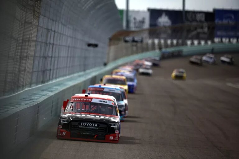 HOMESTEAD, FLORIDA - OCTOBER 26: Corey Heim, driver of the #11 Safelite Toyota, leads the field during the NASCAR Craftsman Truck Series Baptist Health 200 at Homestead-Miami Speedway on October 26, 2024 in Homestead, Florida. (Photo by Sean Gardner/Getty Images)