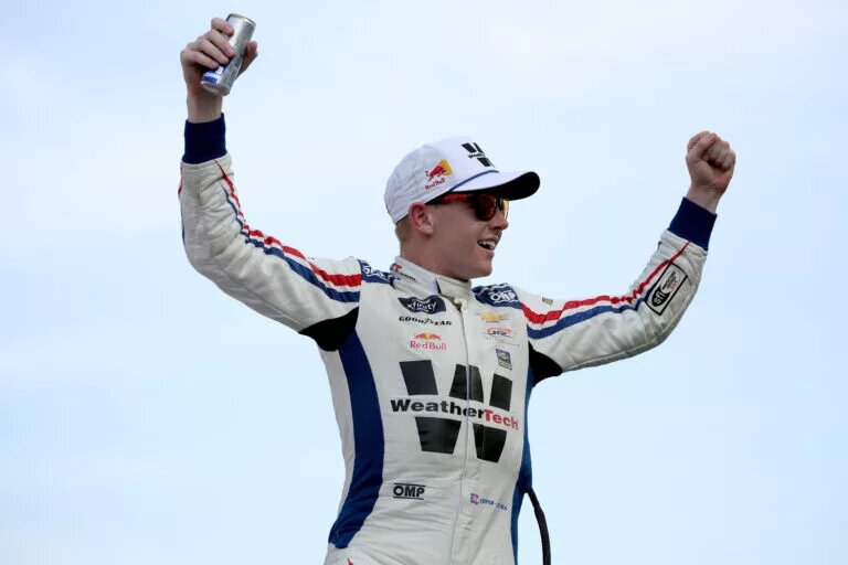 AUSTIN, TEXAS - MARCH 01: Connor Zilisch, driver of the #88 WeatherTech Chevrolet, celebrates in victory lane after winning the NASCAR Xfinity Series Focused Health 250 at Circuit of The Americas on March 01, 2025 in Austin, Texas. (Photo by James Gilbert/Getty Images)
