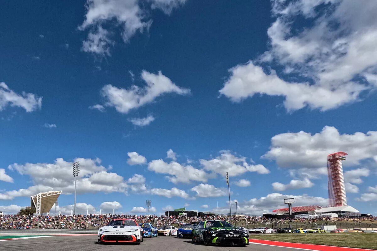 AUSTIN, TEXAS - MARCH 02: Tyler Reddick, driver of the #45 The Beast Toyota, and Bubba Wallace, driver of the #23 Mobil 1 Toyota, lead the field on a pace lap prior to the NASCAR Cup Series EchoPark Automotive Grand Prix at Circuit of The Americas on March 02, 2025 in Austin, Texas. (Photo by James Gilbert/Getty Images)