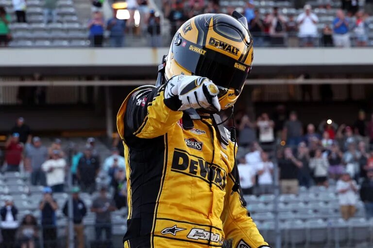 AUSTIN, TEXAS - MARCH 02: Christopher Bell, driver of the #20 DEWALT Toyota, celebrates after winning the NASCAR Cup Series EchoPark Automotive Grand Prix at Circuit of The Americas on March 02, 2025 in Austin, Texas. (Photo by James Gilbert/Getty Images)