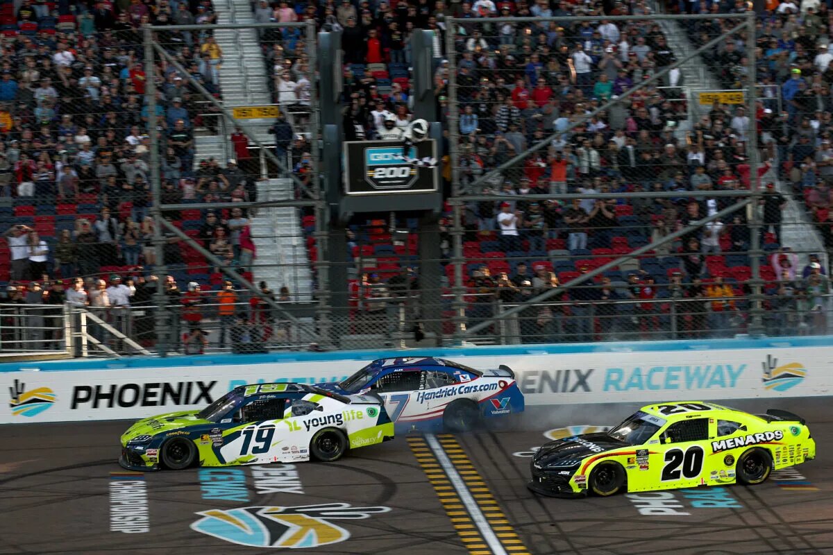 AVONDALE, ARIZONA - MARCH 08: Aric Almirola, driver of the #19 Younglife Toyota, crosses the finish line ahead of Alex Bowman, driver of the #17 HendrickCars.com Chevrolet, and Brandon Jones, driver of the #20 Menards/Pelonis Toyota, to win the NASCAR Xfinity Series GOVX 200 at Phoenix Raceway on March 08, 2025 in Avondale, Arizona. (Photo by Chris Graythen/Getty Images)