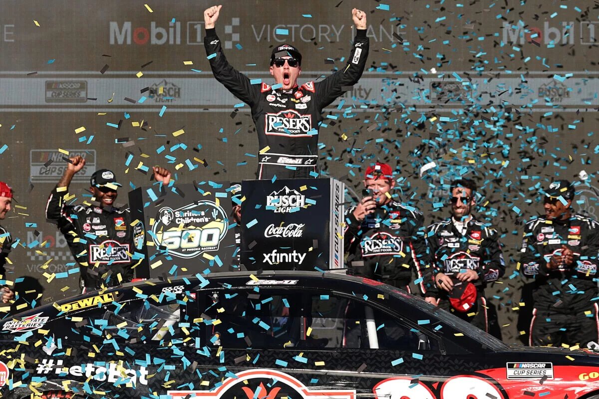 AVONDALE, ARIZONA - MARCH 09: Christopher Bell, driver of the #20 Reser's Fine Foods Toyota, celebrates in victory lane after winning the NASCAR Cup Series Shriners Children's 500 at Phoenix Raceway on March 09, 2025 in Avondale, Arizona. (Photo by Chris Graythen/Getty Images)