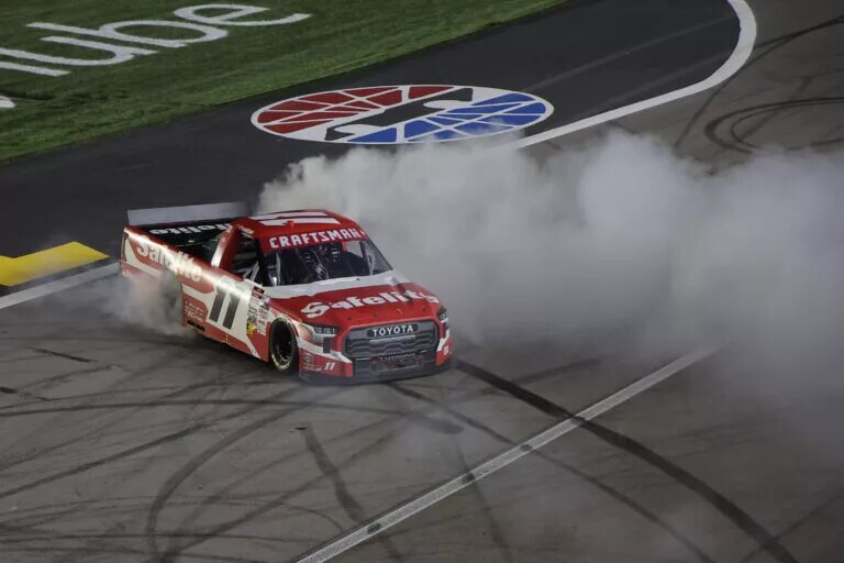 LAS VEGAS, NEVADA - MARCH 14: Corey Heim, driver of the #11 Safelite Toyota, celebrates with a burnout after winning the NASCAR Craftsman Truck Series Ecosave 200 at Las Vegas Motor Speedway on March 14, 2025 in Las Vegas, Nevada. (Photo by Jonathan Bachman/Getty Images)