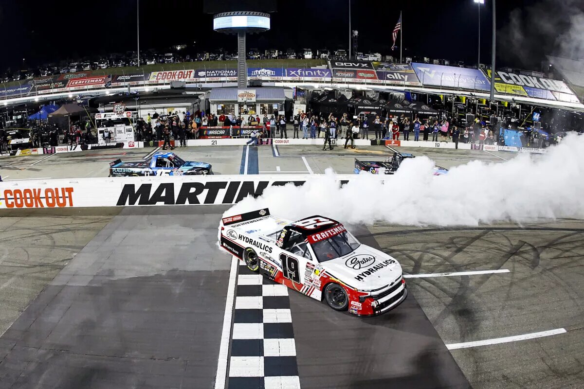 MARTINSVILLE, VIRGINIA - MARCH 28: Daniel Hemric, driver of the #19 Gates Hydraulics Chevrolet, celebrates with a burnout after winning the NASCAR Craftsman Truck Series Boys & Girls Club of the Blue Ridge 200 at Martinsville Speedway on March 28, 2025 in Martinsville, Virginia. (Photo by Logan Riely/Getty Images)