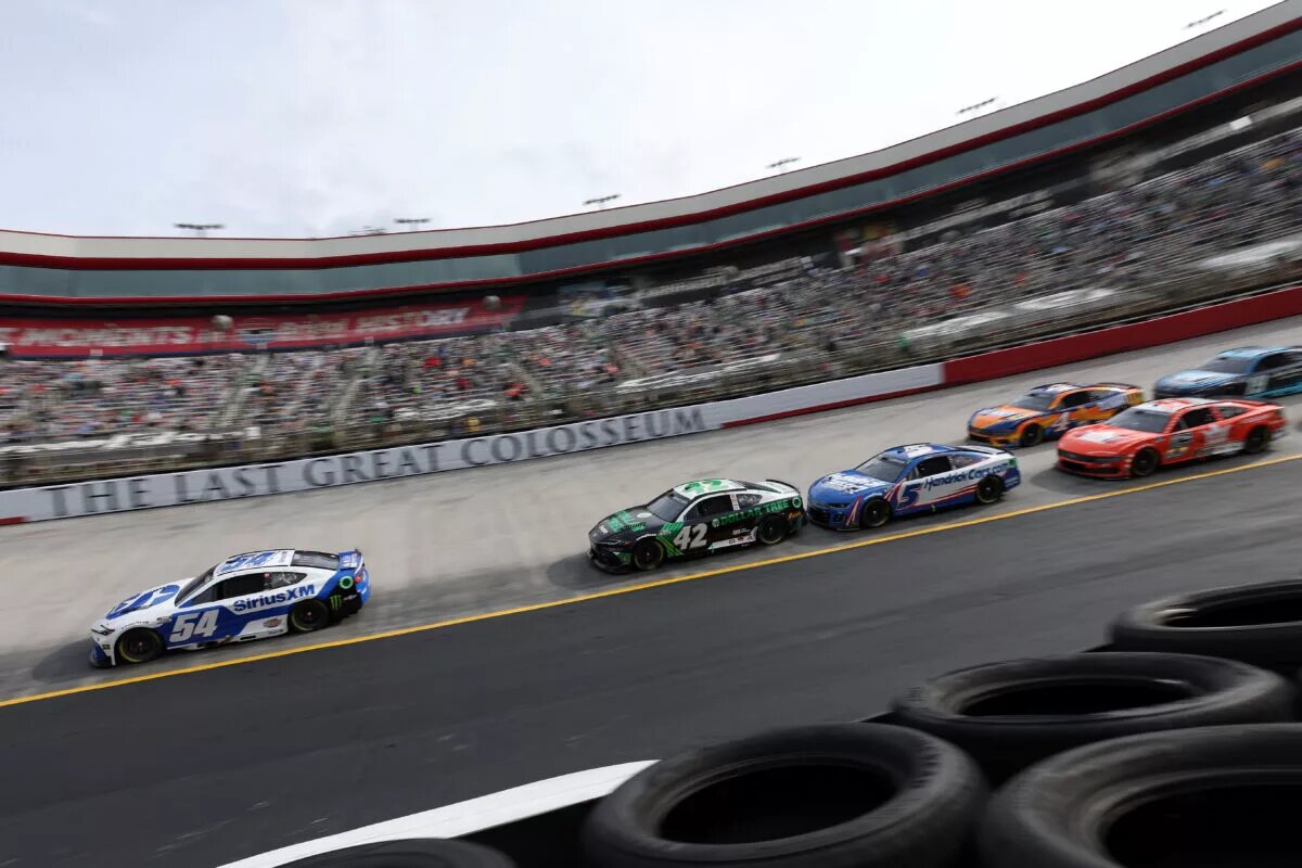BRISTOL, TENNESSEE - MARCH 17: Ty Gibbs, driver of the #54 SiriusXM Toyota, leads the field during the NASCAR Cup Series Food City 500 at Bristol Motor Speedway on March 17, 2024 in Bristol, Tennessee. (Photo by Meg Oliphant/Getty Images)