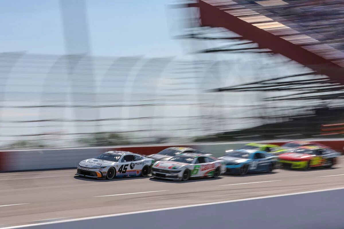 DARLINGTON, SOUTH CAROLINA - MAY 12: Tyler Reddick, driver of the #45 MoneyLion Toyota, and Brad Keselowski, driver of the #6 Castrol Ford, lead the field during the NASCAR Cup Series Goodyear 400 at Darlington Raceway on May 12, 2024 in Darlington, South Carolina. (Photo by James Gilbert/Getty Images)