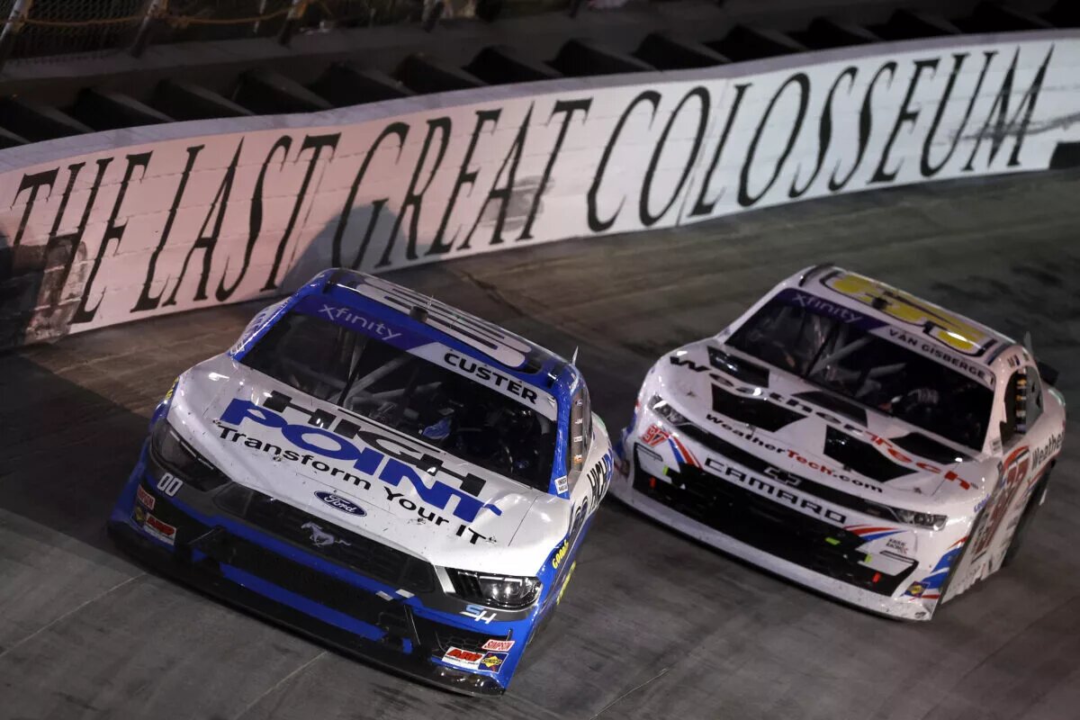 BRISTOL, TENNESSEE - SEPTEMBER 20: Cole Custer, driver of the #00 HighPoint.com Ford, and Shane Van Gisbergen, driver of the #97 WeatherTech Chevrolet, race during the NASCAR Xfinity Series Food City 300 at Bristol Motor Speedway on September 20, 2024 in Bristol, Tennessee. (Photo by James Gilbert/Getty Images)