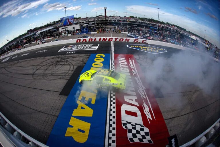 DARLINGTON, SOUTH CAROLINA - APRIL 05: Brandon Jones, driver of the #20 Menards/Turtle Wax Toyota, celebrates with a burnout after winning the NASCAR Xfinity Series port Clips Haircuts VFW Help A Hero 200 at Darlington Raceway on April 05, 2025 in Darlington, South Carolina. (Photo by Jared C. Tilton/Getty Images)