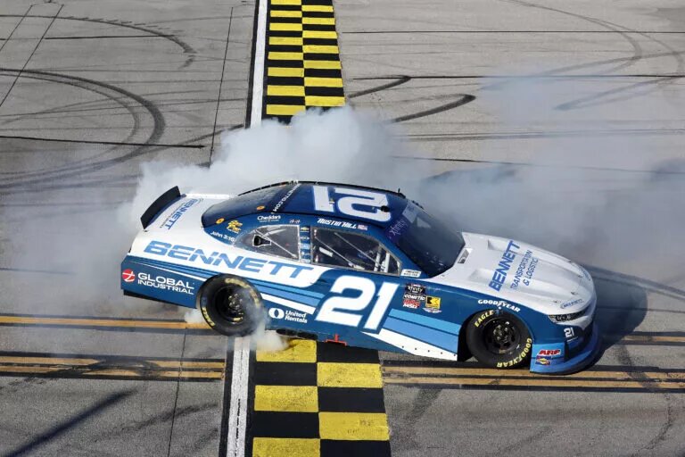 TALLADEGA, ALABAMA - APRIL 26: Austin Hill, driver of the #21 Bennett Transportation Chevrolet, celebrates with a burnout after winning the NASCAR Xfinity Series Ag-Pro 300 at Talladega Superspeedway on April 26, 2025 in Talladega, Alabama. (Photo by Logan Riely/Getty Images)