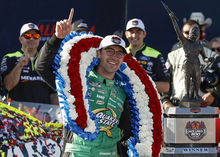 TALLADEGA, ALABAMA - APRIL 27: Austin Cindric, driver of the #2 Menards/Quaker State Ford, celebrates in victory lane after winning the NASCAR Cup Series Jack Link's 500 at Talladega Superspeedway on April 27, 2025 in Talladega, Alabama. (Photo by Sean Gardner/Getty Images)