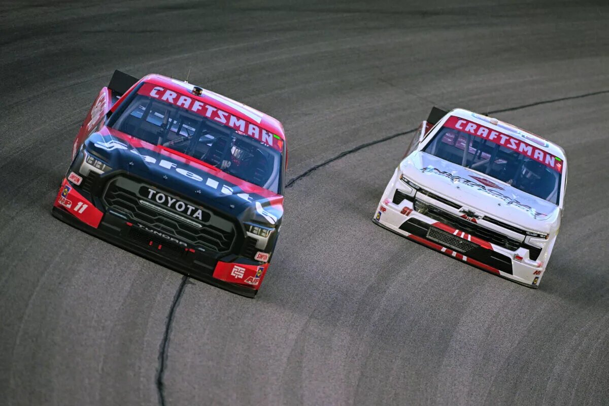KANSAS CITY, KANSAS - MAY 04: Corey Heim, driver of the #11 Safelite Toyota, and Zane Smith, driver of the #91 Instacoat Premium Products Chevrolet, race during the NASCAR Craftsman Truck Series Heart of America 200 at Kansas Speedway on May 04, 2024 in Kansas City, Kansas. (Photo by Logan Riely/Getty Images)