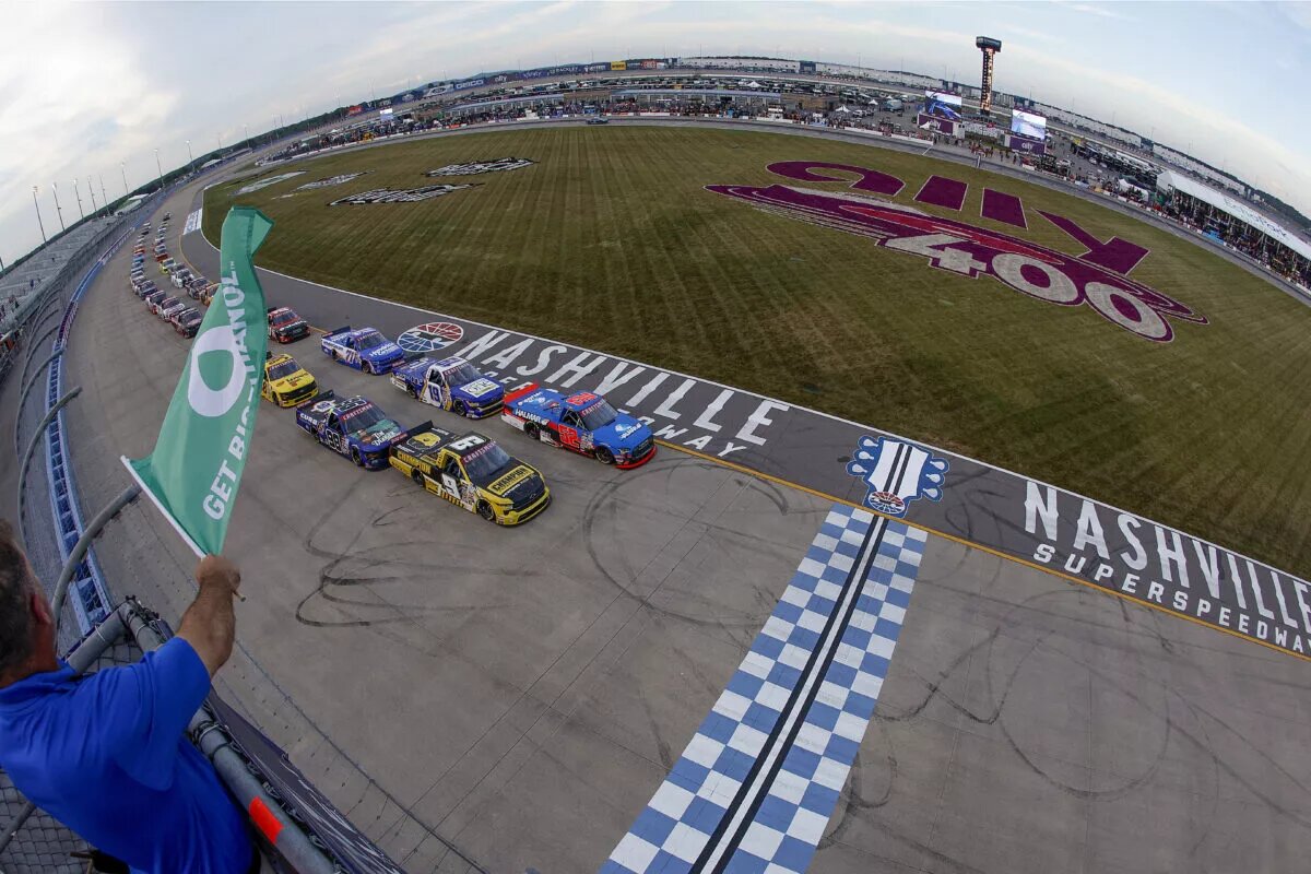 LEBANON, TENNESSEE - JUNE 28: Stewart Friesen, driver of the #52 Halmar International Toyota, leads the field to the green flag to start the NASCAR Craftsman Truck Series Rackley Roofing 200 at Nashville Superspeedway on June 28, 2024 in Lebanon, Tennessee. (Photo by Sean Gardner/Getty Images)