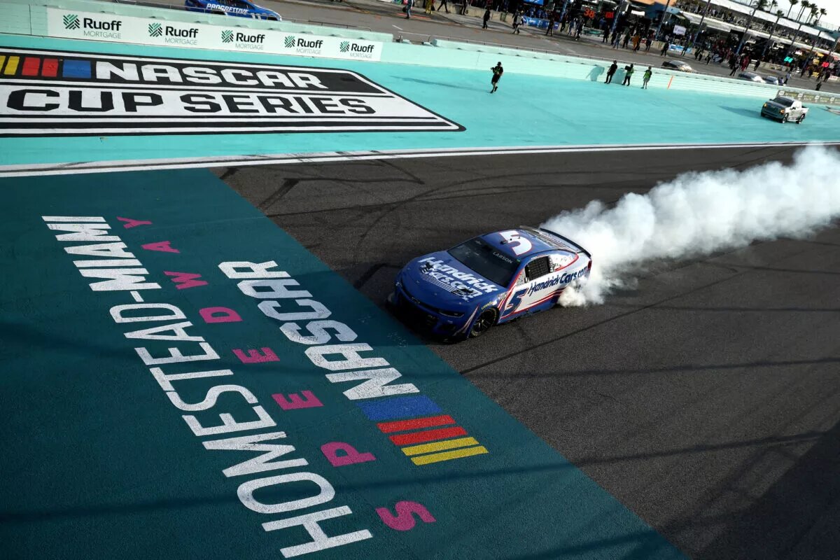 HOMESTEAD, FLORIDA - MARCH 23: Kyle Larson, driver of the #5 HendrickCars.com Chevrolet, celebrates with a burnout after winning the NASCAR Cup Series Straight Talk Wireless 400 at Homestead-Miami Speedway on March 23, 2025 in Homestead, Florida. (Photo by Chris Graythen/Getty Images)