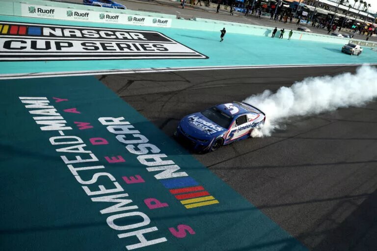 HOMESTEAD, FLORIDA - MARCH 23: Kyle Larson, driver of the #5 HendrickCars.com Chevrolet, celebrates with a burnout after winning the NASCAR Cup Series Straight Talk Wireless 400 at Homestead-Miami Speedway on March 23, 2025 in Homestead, Florida. (Photo by Chris Graythen/Getty Images)