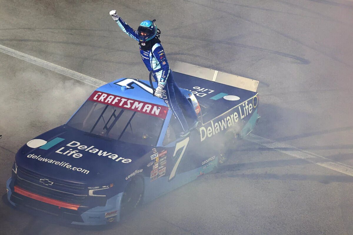 KANSAS CITY, KANSAS - MAY 10: Carson Hocevar, driver of the #7 Delaware Life Chevrolet, celebrates after winning the NASCAR Craftsman Truck Series Heart of Health Care 200 at Kansas Speedway on May 10, 2025 in Kansas City, Kansas. (Photo by Jamie Squire/Getty Images)