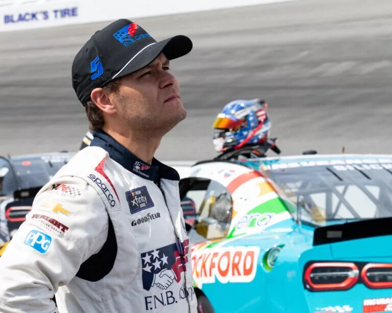 April 19, 2025, Rockingham, North Carolina, USA: NASCAR, Motorsport, USA Xfinity Series driver KRIS WRIGHT (5) looks up at the grandstands before qualifying for the NASCAR XFINITY Series North Carolina Education Lottery 250 at Rockingham Speedway