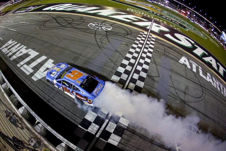 Chase Elliott, driver of the #9 NAPA/Children's Chevrolet, celebrates with a burnout after winning the NASCAR Cup Series Quaker State 400 Available at Walmart at Echo Park Speedway on June 28, 2025 in Hampton, Georgia. (Photo by Sean Gardner/Getty Images)