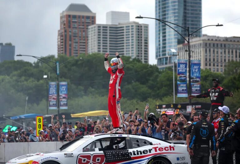 Shane Van Gisbergen, driver of the #88 WeatherTech Chevrolet, and crew celebrate after winning the NASCAR Cup Series Grant Park 165 at Chicago Street Course on July 06, 2025 in Chicago, Illinois. (Photo by James Gilbert/Getty Images)
