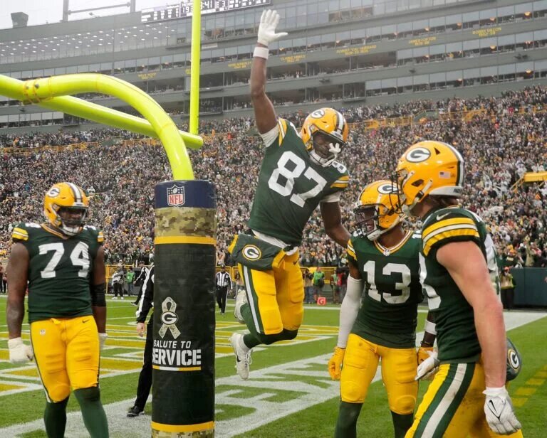 Green Bay Packers wide receiver Romeo Doubs and tight end Luke Musgrave