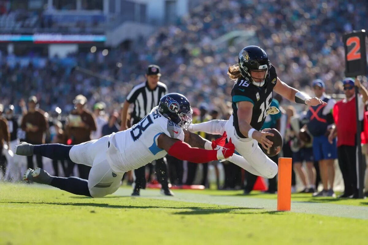 Trevor Lawrence diving for the Touchdown as the Jaguars beat the Titans