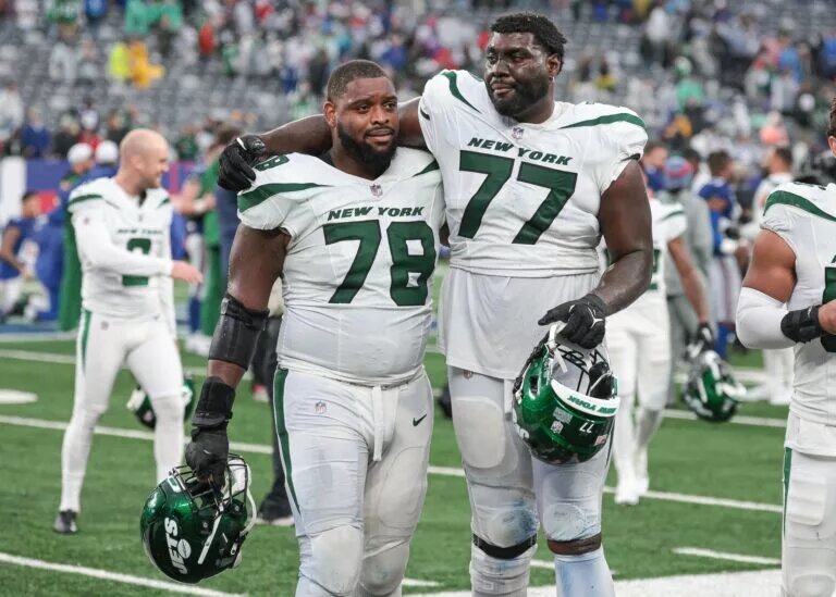 New York Jets offensive linemen Laken Tomlinson and Mekhi Becton