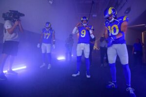 Cooper Kupp, Matthew Stafford, and Puka Nacua of the Los Angeles Rams