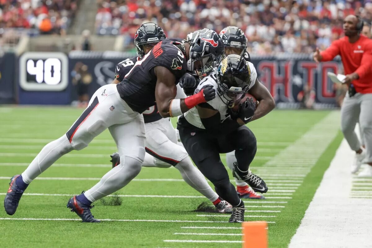 chargers ravens travis etienne