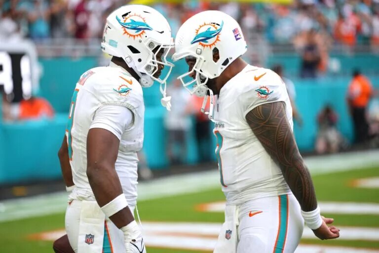 Miami Dolphins tight end Jonnu Smith and Tua Tagovailoa