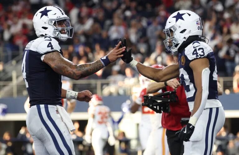Dak Prescott, quarterback, and Malik Davis, running back, Dallas Cowboys